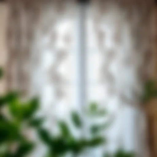 Elegant gray floral sheer curtains draping over a window, showcasing intricate floral patterns.