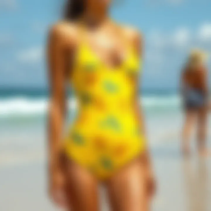 Vivid lemon-patterned swim suit on a beach