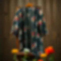 A stunning plus size boho cardigan in a floral pattern, draped elegantly over a rustic wooden chair.