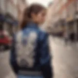 Stylish varsity jacket with bone motifs displayed in an urban setting