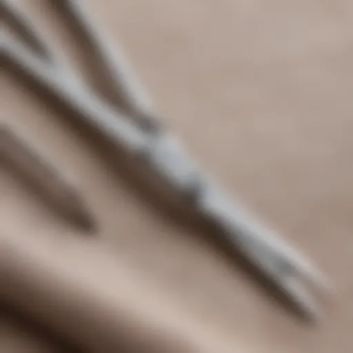 Close-up of finely crafted trimming scissors on a fabric swatch