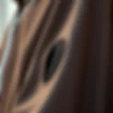 Close-up of thumb hole detail in yoga jacket